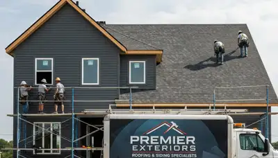 Roof installation experts fitting durable vinyl siding in Denver, CO homes for long-lasting protection